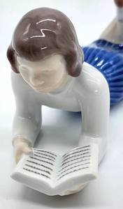 lot 353 image: Bing and Grndahl Girl with Book Porcelain Figurine Number 2304