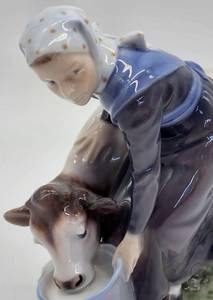 lot 362 image: Christian Thomas Royal Copenhagen Girl and Calf Porcelain Figurine, Number 779