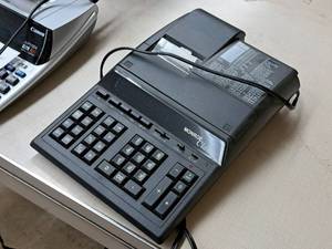 lot 528 image: Monroe Classic Electric Calculator with Paper Printout