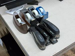 lot 523 image: Swingline Staplers and Scotch Tape Dispensers Office Supplies - (4) Staplers and (4) Tape Dispensers