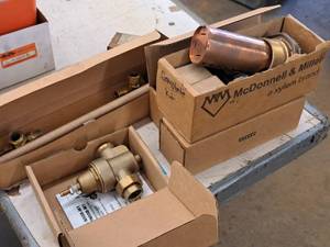 lot 389 image: Lot of (6) McDonald & Miller Plumbing Parts (in box) - Water Pressure Reducing Valve, Low Water Cut-Off, Float & Bellows Assembly, Head Mechanism 6667