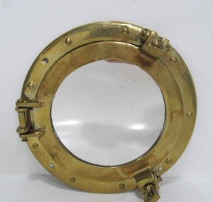 lot 42 image: Solid Brass Nautical Porthole Mirror