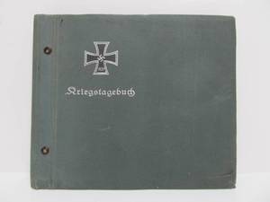 lot 68 image: Original WW2 U.S. Soldier Scrapbook wPhotos in German Military Binder