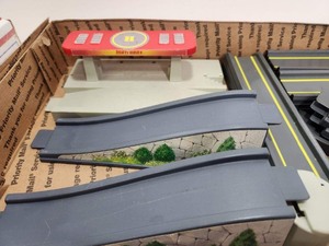 lot 171 image: Large Lot of Vintage 1970s era Matchbox Car Accessories Roads Buildings Signs etc