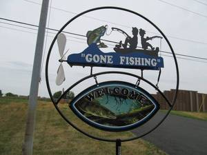 lot 345 image: Great Looking Metal GONE FISHING Outdoor Whirligig Welcome Sign