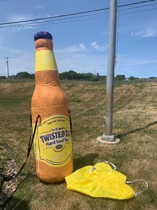lot 288 image: LARGE Brand New TWISTED TEA Outdoor Inflatable Advertising Bottle