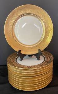 lot 197 image: Golden and White Serving Pieces and Plates