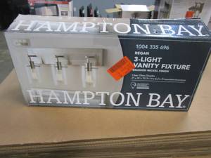 lot 127 image: Hampton Bay Regan 21 in. 3-Light Brushed Nickel Bathroom Vanity Light with Clear Glass Shades (OPEN BOX)