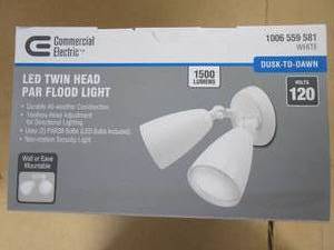 lot 81 image: Commercial Electric Twin-Head Directional White Outdoor Integrated LED Flood Light for Outdoor Security Lighting with Photocell