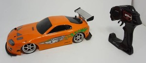 lot 79 image: Jada Toys Fast & Furious 110 Toyota Supra Remote Control Car Drift Slide RC