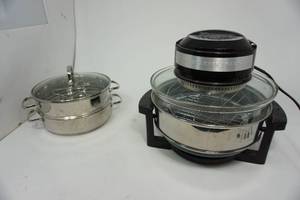 lot 100 image: Sharper Image Air And A Steamer