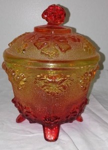 lot 32 image: Vintage Jeannette Amberina Footed Covered Dish.