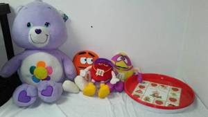 lot 34 image: Care Bear And M&M Stuffies.