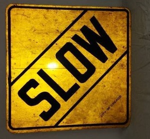 lot 72 image: Metal SLOW Sign.