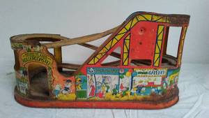 lot 120 image: J. Chien Litho Tin Disneyland Roller Coaster and More.
