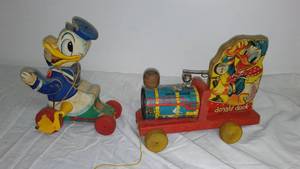 lot 127 image: Fisher Price Donald Duck Toys. (2)