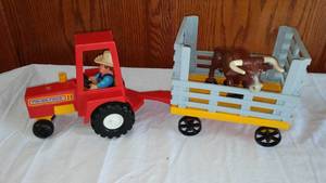 lot 276 image: Vintage Fisher Price Tractor And Wagon.