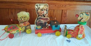 lot 281 image: 1960 Teddy Zilo  And Squeaky The Clown Fisher Price Pull Toy.