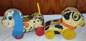 lot 282 image: Playful Puppy And Butch Fisher Price Pull Toy.