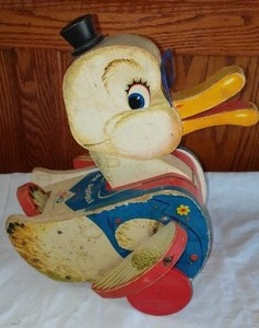 lot 283 image: Dr. Doodle Fisher Price Pull Toy.