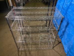 Two 4 Shelf Storage Racks
