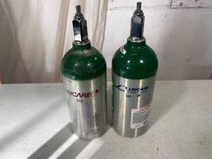 2 LinCare Oxygen Bottles Empty