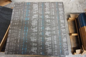 lot 91 image: (32 pcs.) 24 x 24 Carpet Tiles by Mohawk