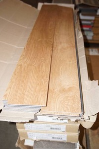 lot 117 image: (2 Boxes) 4 x 36 Tile Flooring by Shaw