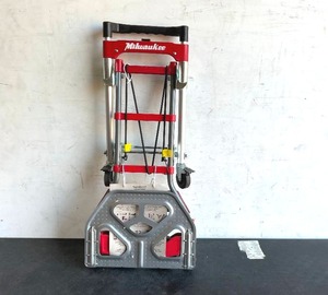 lot 209 image: Milwaukee 150 lbs. vertical and 300 lbs. horizontal Capacity Folding Convertible hand Truck