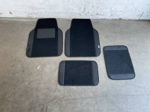 lot 59 image: FH Group Set of 4 Black Car Floor Mats with PU Leather Trim