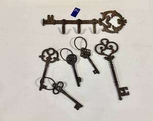 lot 7 image: Cast Iron Key Display Rack & Keys