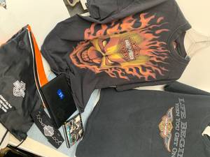 lot 55 image: Harley Davidson Items Shirts, Bag