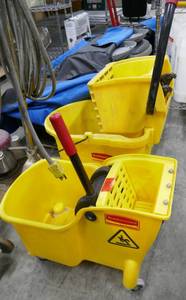 lot 90 image: 2 mop buckets, yellow rubbermaid