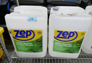 lot 113 image: 5 gallon jug of Zep floor polish, the other one is about empty