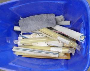 lot 120 image: Blue tote with a bunch of floor mop refills