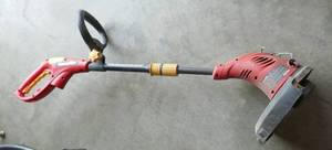 lot 152 image: 13 inch Homelite electric weed trimmer - works