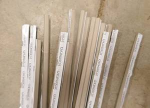 lot 175 image: Twenty 4ft long strips - Fabric-Over-Foam EMI Shielding gasket adhesive strip Rectangle shape