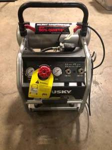 lot 16 image: Husky 4.5 Gal. Portable Electric-Powered Silent Air Compressor Customer Returns See Pictures