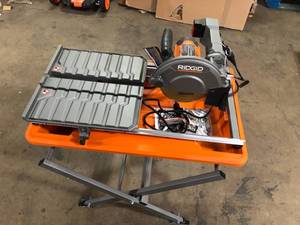 RIDGID 9 Amp Corded 7 in. Wet Tile Saw with Stand  Customer Returns See Pictures