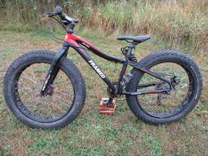 lot 29 image: Black and Red FRAMED Wolftrax bike