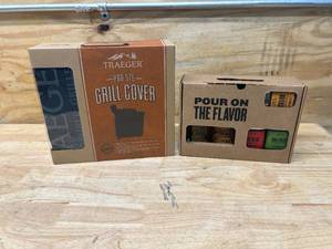 lot 96 image: TRAEGER Pro 575 Grill Cover with Sauce and Rub Kit