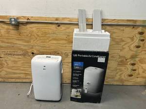 lot 29 image: LG 7,000 BTU (DOE) 115-Volt Portable Air Conditioner LP0721WSR Cools 300 Sq. Ft. with Dehumidifier Function and LCD Remote