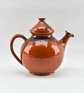 lot 156 image: Orange Glazed Ceramic Kettle by Hegnetslund