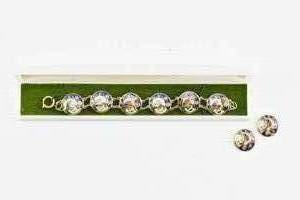 lot 260 image: Irish Bracelet and Earrings Inspired by the Book of Kells
