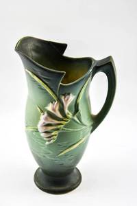 lot 330 image: Green Ceramic Freesia Pitcher by Roseville Pottery