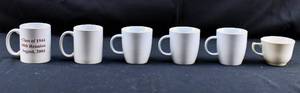 lot 242 image: 10 White Coffee Mugs and a Black and Decker Coffee Maker Missing Carafe
