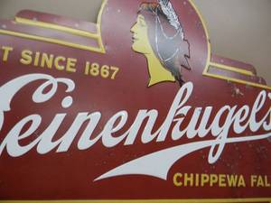 lot 41 image: Authentic Leinenkugels Beer Indian Maiden Embossed Metal Sign - AWESOME PIECE - APPROX 41 By 36 - SEE PICTURES