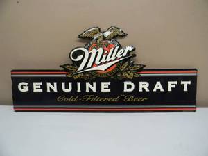 lot 46 image: VINTAGE MILLER GENUINE DRAFT EMBOSSED METAL  TIN BAR SIGN - AWESOME PIECE - APPROX 30 By 14 - SEE PICTURES