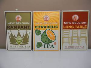 lot 71 image: NEW BELGIUM CITRADELIC - LONG TABLE & RAMPANT EMBOSSED METAL  TIN BAR SIGNS - AWESOME PIECES - APPROX 11 By 17 - SEE PICTURES