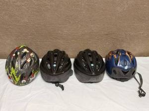 lot 41 image: 4 BIKING HELMETS